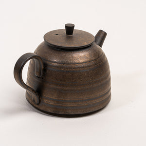 Elegant Handle On A Ceramic Teapot