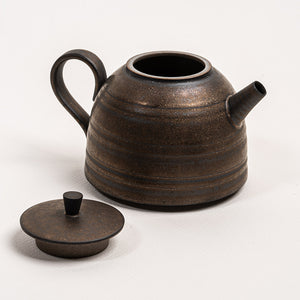 Traditional Metalwork Styled Finial On Ceramic Teapot