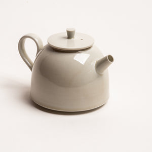 Traditional Metalwork Style In A Teapot with A Clean Look