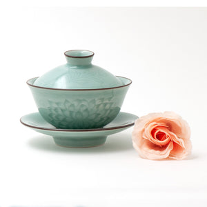 Celadon Porcelain Gaiwan In Smoky Blue With Water Lily Bas Relief Glaze Design