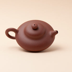 Petite Yixing Teapot In Authentic Purple Clay Top View